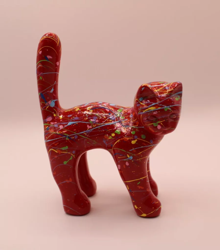 Beeld kleine kat rood met spatten